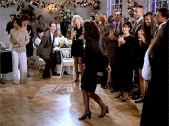 Elaine from the television show 'Seinfeld' dancing awkwardly. 
