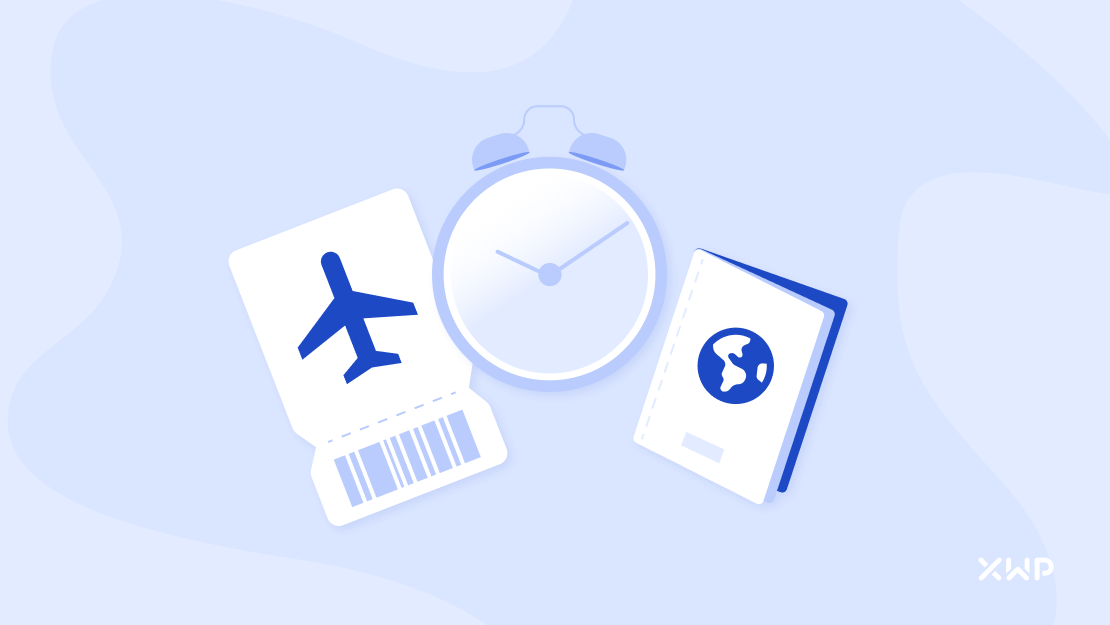 An airline ticket, an alarm clock, and a passport, signifying the time for location independence.