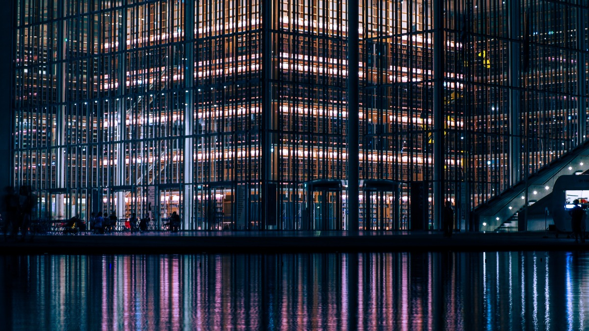 Reflection of a Building on Water Surface
