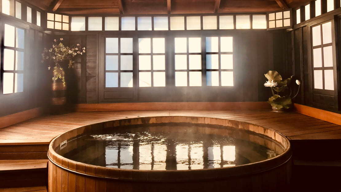 An indoor pool of hot water for bathing.