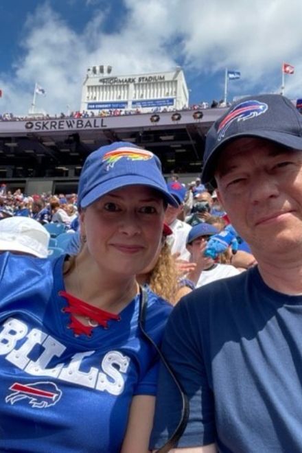 Emily sitting in the stands for a Bills game