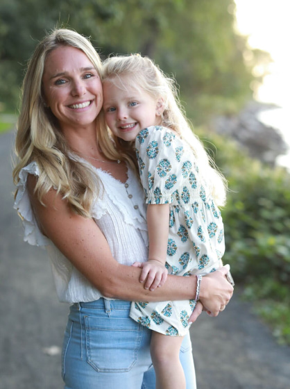 Caitlyn and her daughter smiling