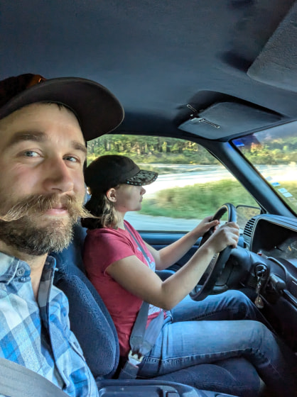 Landon and his daughter driving a car