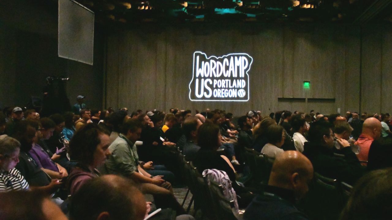 Audience sitting in a conference room during WordCamp US 2024